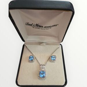 NIB BLUE TOPAZ AND DIAMOND NECKLACE AND EARING SET